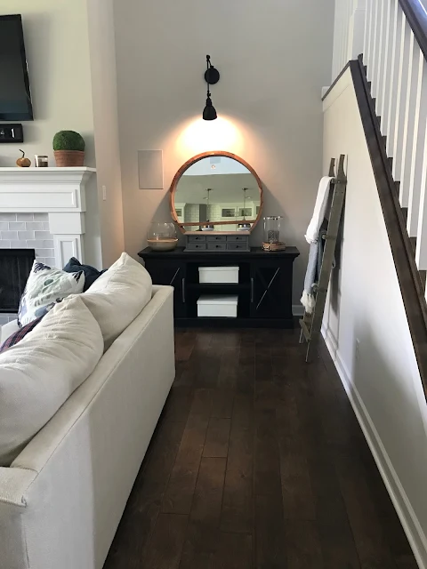 matching furniture on both sides of fireplace