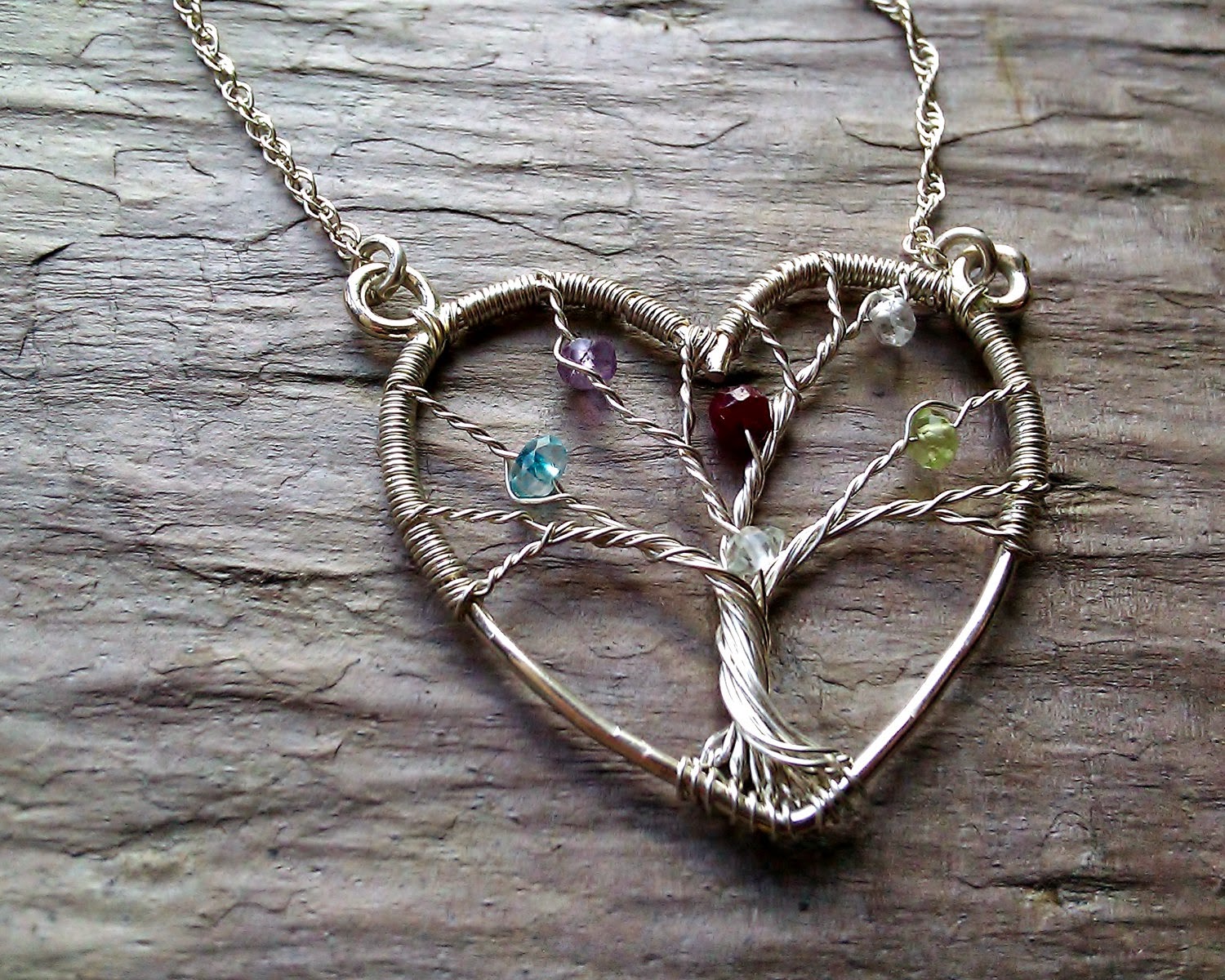 https://www.etsy.com/listing/72678116/heart-family-tree-necklace-personalized