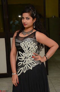 Shrisha Dasari in Sleeveless Short Black Dress At Follow Follow U Audio Launch 029.JPG