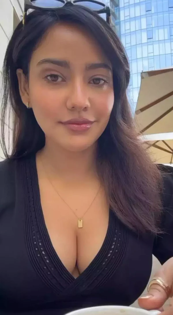 neha sharma cleavage black outfit busty indian actress