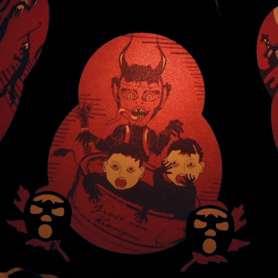 Limited edition lantern (close up) features 12 images of the Christmas devil Krampus