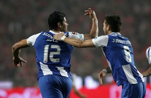 Hulk celebrates his goal against Benfica with his Porto team-mate João Moutinho