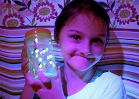 Tessa's completed "Glow-in-the-Dark Firefly Jar." Pretty cool, huh? Tessa adores it so much that she keeps it beside her bed at night.