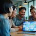 Happy diverse team brainstorming on laptop