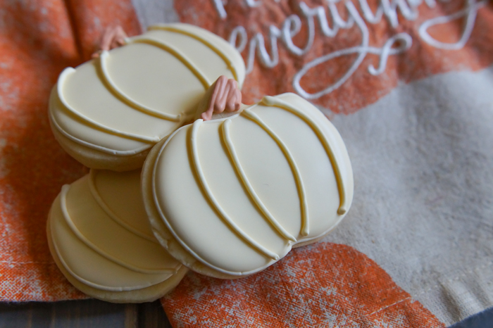 ivory decorated pumpkin cookies, royal icing