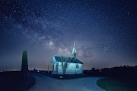 Church illuminated - Photo by Pascal Debrunner on Unsplash