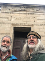 Mark (left) and John (right) standing in front of the doors of Hope Abbey, in the Eugene Pioneer Cemetery.