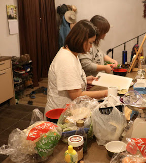 Our guests preparing us a feast