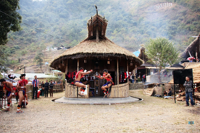 Young Lotha Naga Men In Traditional Attire Playing Traditional Games at Hornbill Festival 