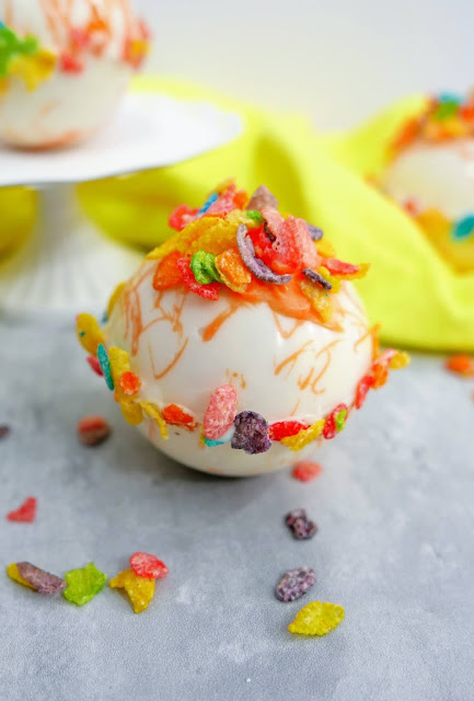 Fruity Pebbles Hot Cocoa Bombs with fruity sprinkles