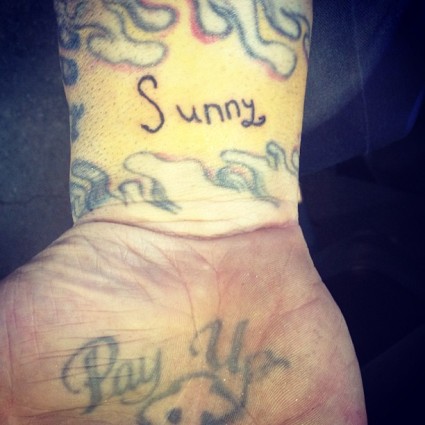 Sunny helped a tattooartist ink her name on dad's wrist 