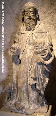 Statue de Saint Antoine en pierre calcaire de Jaumont. Début XVIe siècle.