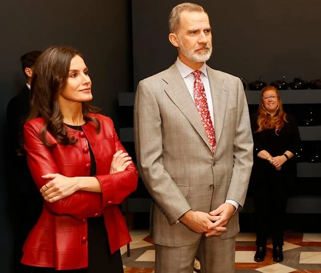 Queen Letizia wore a red leather peplum jacket by Carolina Herrera, and black wool cashmere dress by Carolina Herrera