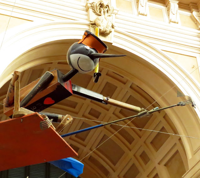 Pinocchio with mask, flippers, and spear, Mercato Centrale (Central Market), Livorno