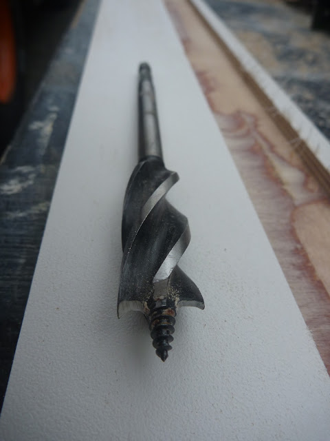 Four flute drill bit. Quicker and cleaner than a spade bit