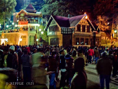 Posted by Ripple (VJ) on PHOTO JOURNEY @ www.travellingcamera.com : Youngsters Celebrating on New Year Eve @ Shimla, Himachal Pradesh: New Year Eve is considered as special time for celebrations. In modern times New Year Eve is celebrated with parties and social gatherings spanning the transition of the year at midnight. Here are few Photogrpahs of such gatherings on Ridge in Shimla....:ripple, Vijay Kumar Sharma, ripple4photography, Frozen Moments, photographs, Photography, ripple (VJ), VJ, Ripple (VJ) Photography, Capture Present for Future, Freeze Present for Future, ripple (VJ) Photographs , VJ Photographs, Ripple (VJ) Photography : Here I am seeing a lot of space middle of tourists standing on Ridge in front of Shimla Public Library building.... Everyone is packed with multi layered cloths to be there till 1:00 AM for Welcoming New Year in chilling air... If you plan for Shimla pack caps, Jackets n all other warm cloths with your... btw Shimla is a good place for shopping.. specially for buying Warm cloths...