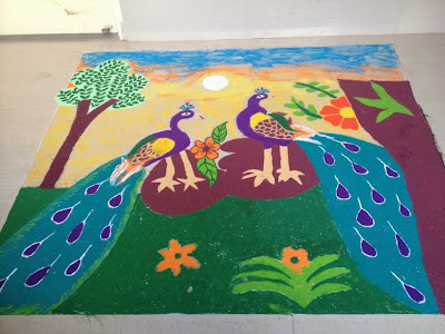 very nice peacock rangoli