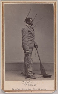 A slave from Louisiana exhibiting instruments of torture