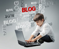 Child sitting at a computer with the word blog written many times around him in the air