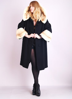 Vintage 1950's black wool swing coat with white mink scalloped collar and cuffs.