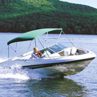 green Taylor Made Bimini Top on a bow rider Runabout