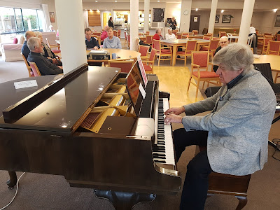 Ian Jackson playing the Schimmel grand piano