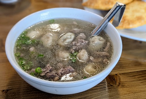 Traditional lamb soup with dumplings