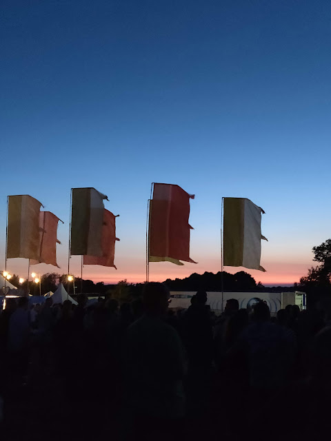 Flags at dusk at Cornbury Music Festival