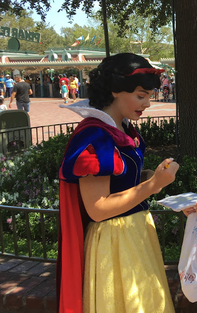 Snow White Signing Autographs in Disneyland