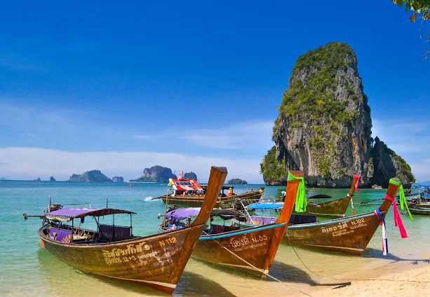 colourful boats in phuket beach