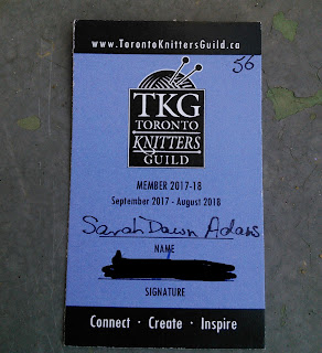 Image of the 2017-2018 Toronto Knitter's Guild Membership.  It has the TKG website (www.torontoknittersguild.ca) across the top of the card.  TThe centre of the card has the TKG Logo.  The bottom of the card has a Name and Signature Space.  Name reads: Sarah Dawn Adams.  Signature has been blacked out. 