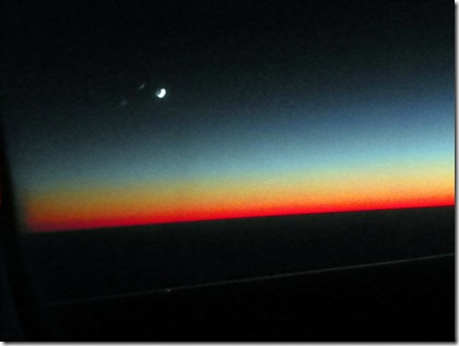 The moon was actually just a slither of light as the red glow of sunset lingered.