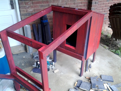 framing for the open portion of the rabbit hutch is begun, front door is tested