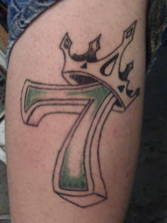 Crowned Seven Symbol Tattoo
