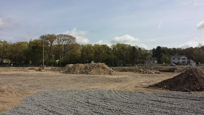 grading the area where the new artificial turf field is scheduled to go at Franklin High School