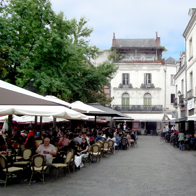 Place Plumereau, Tours.  Indre et Loire, France. Photographed by Susan Walter. Tour the Loire Valley with a classic car and a private guide.