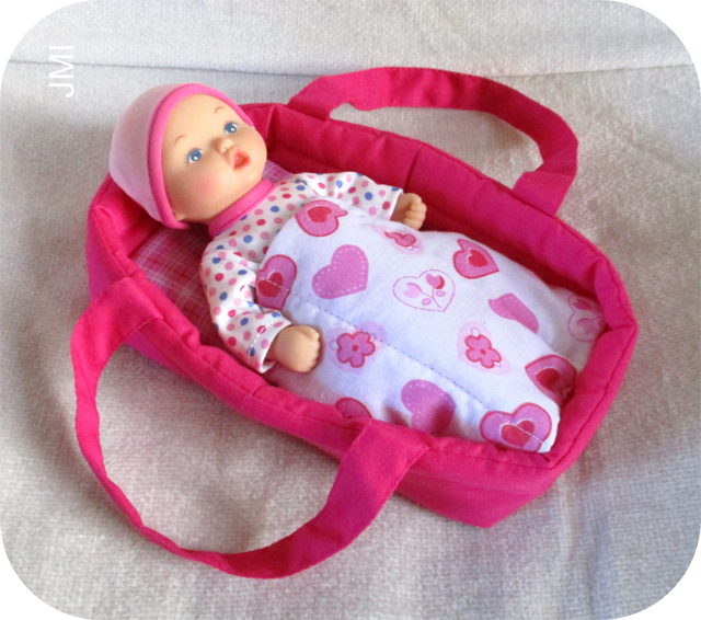 Learn how to make a portable carry bed for a baby doll. Tutorial by Crafting for Shoeboxes