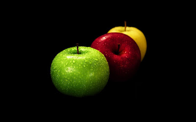 apples on black background