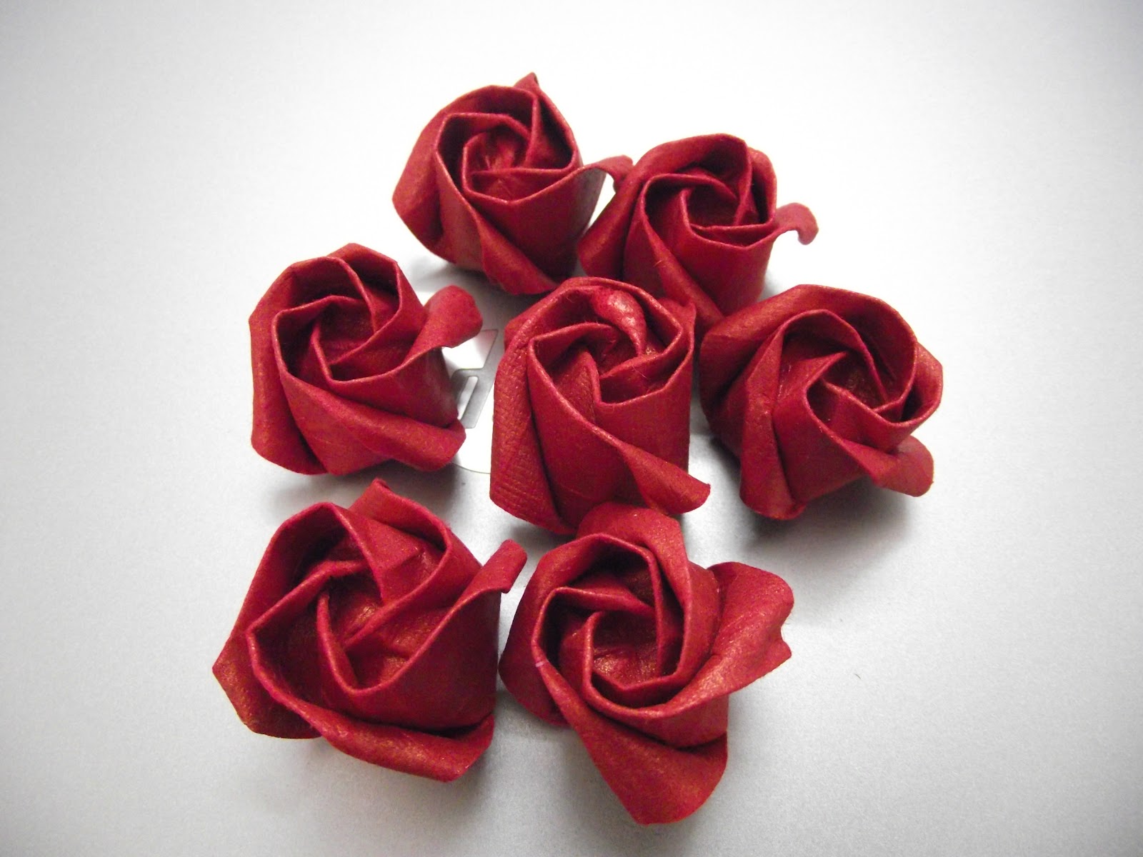 used red colour handmade paper to make the roses.