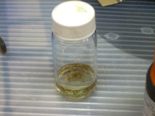 aminoterephthalic acid crystals in a scintillation vial