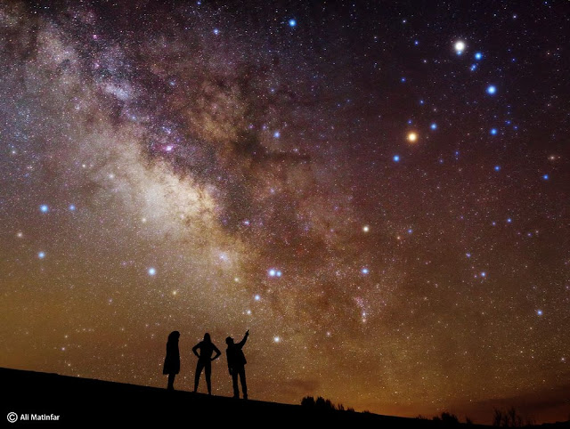 Ali Matinfar captured this image of stargazers under the Milky Way from the Mesr Desert in Iran.   Ali Matinfar / Online Photo Gallery