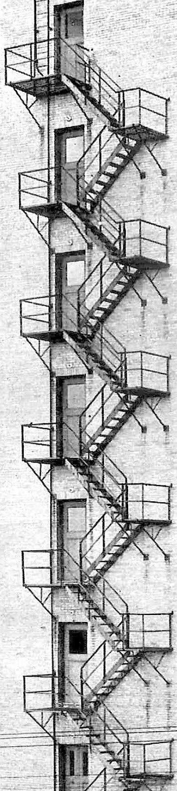 a tall thin photograph of an old fire escape