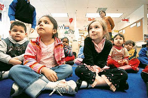 Pre-kindergarten students participate in activities at Carlin Springs Elementary School in Arlington, Va., Thursday, March 8, 2007.  From left are, Jose Chavez,  Danielle Moreno, and Lilli Anne Morris. (AP Photo/Gerald Herbert)