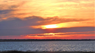 sunset on Charleston Harbor from Mt Pleasant