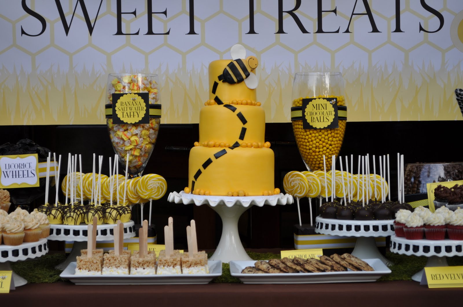 wedding cake pops ideas The 3-tier cake was the centerpiece of this dessert table