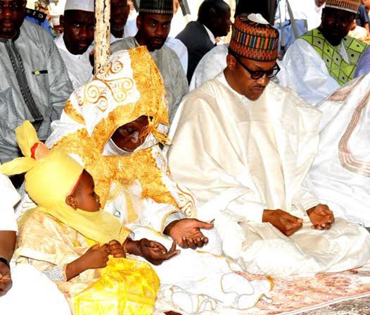 In Pictures: President Buhari observes Eid prayers, slaughters ram
