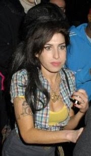 Amy Winehouse charged with assault