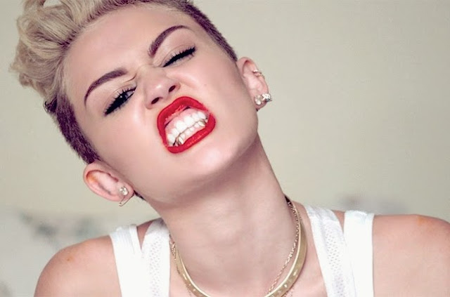 Miley Cyrus ft Nelly - 4x4 - traduzione testo video download