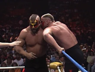 WCW Starrcade 1989 - Hawk and Animal confer in the corner