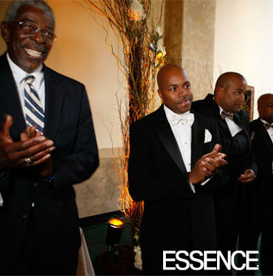 The ceremony decoration consisted of tall branches in vase filled rock 